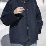 Short bomber jacket with snap buttons